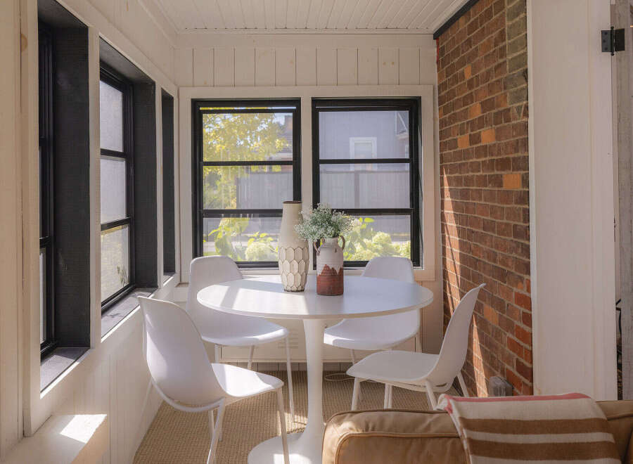 Enjoy the charm of this sun-drenched sunroom, perfect for morning coffee or evening relaxation.