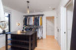 Step into luxury with this stunning walk-in closet, designed for both style and functionality.