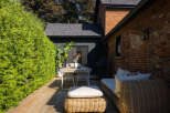 Enjoy outdoor living at its finest with this stunning property featuring a beautifully designed patio.
