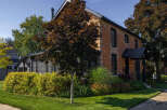 This stunning brick home offers timeless charm and modern comfort.