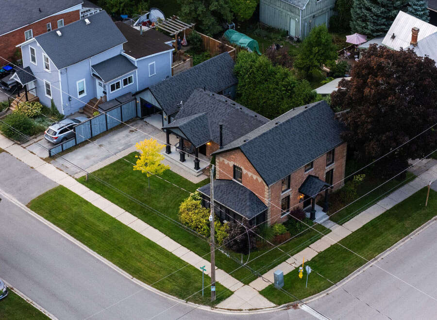 Discover a charming brick home with a classic design, perfect for those seeking character and comfort.