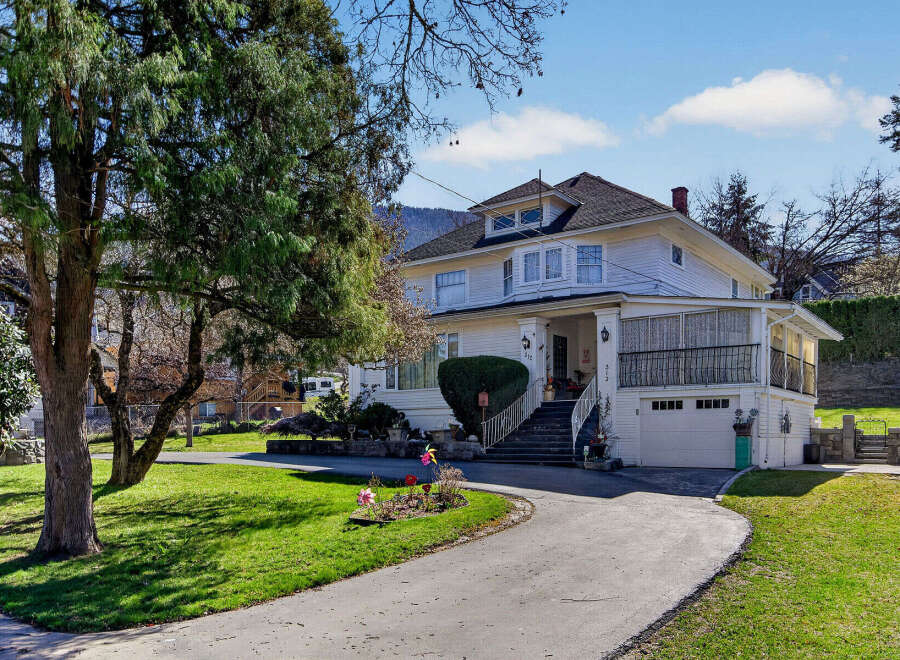Charming two-story home with a welcoming curb appeal.