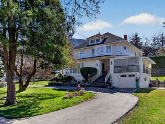 Charming two-story home with a welcoming curb appeal.