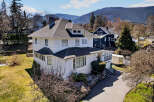 This stunning white house boasts a classic design with a charming facade and a well-maintained exterior.