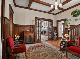 Step into timeless elegance with this stunning property, showcasing exquisite craftsmanship and classic design.