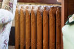 This image showcases a beautifully preserved antique radiator, a charming detail often found in historic homes.