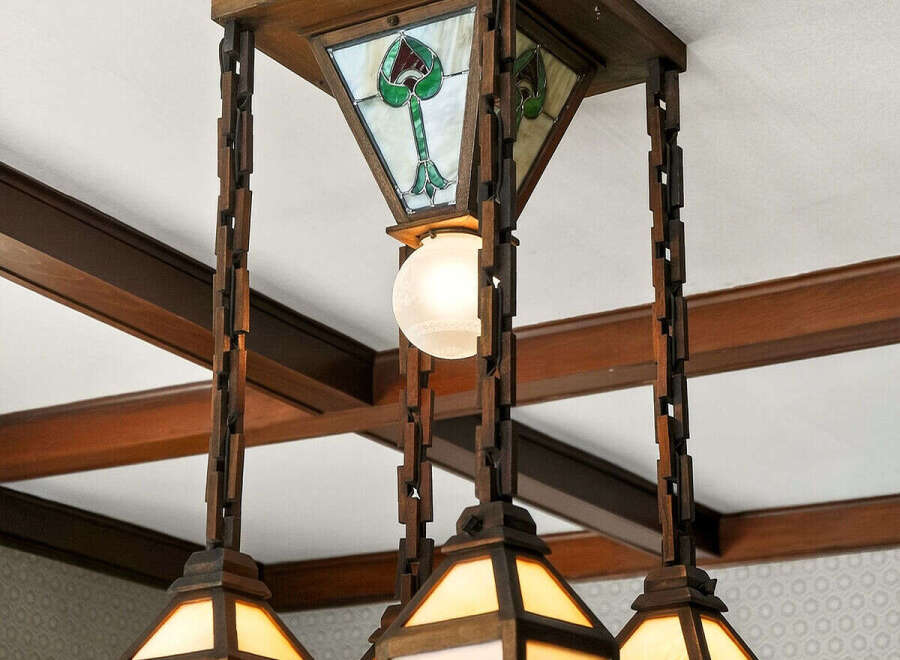 This stunning property boasts a unique and elegant lighting fixture, adding a touch of sophistication to the space.