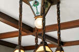 This stunning property boasts a unique and elegant lighting fixture, adding a touch of sophistication to the space.