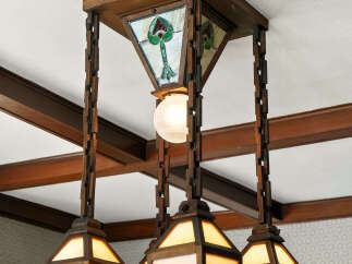 This stunning property boasts a unique and elegant lighting fixture, adding a touch of sophistication to the space.
