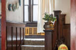 Step into timeless elegance with this stunning property featuring a beautifully crafted staircase.