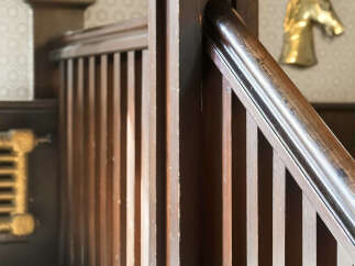 This stunning property boasts a beautifully crafted wooden staircase, adding a touch of elegance and warmth to the interior.
