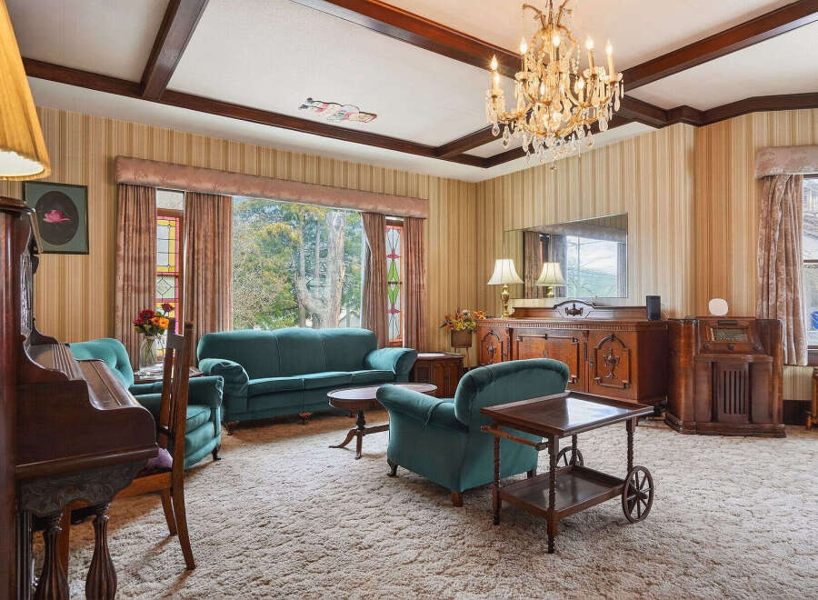 Step back in time with this stunning living room, showcasing classic elegance and charm.