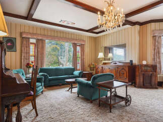 Step back in time with this stunning living room, showcasing classic elegance and charm.