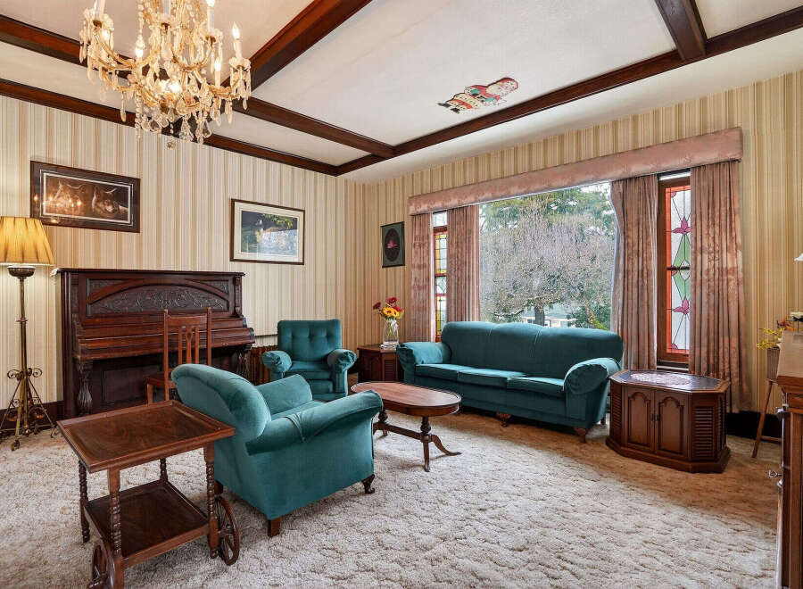 Step into a classic living space with this charming property.