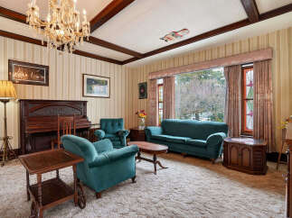Step into a classic living space with this charming property.