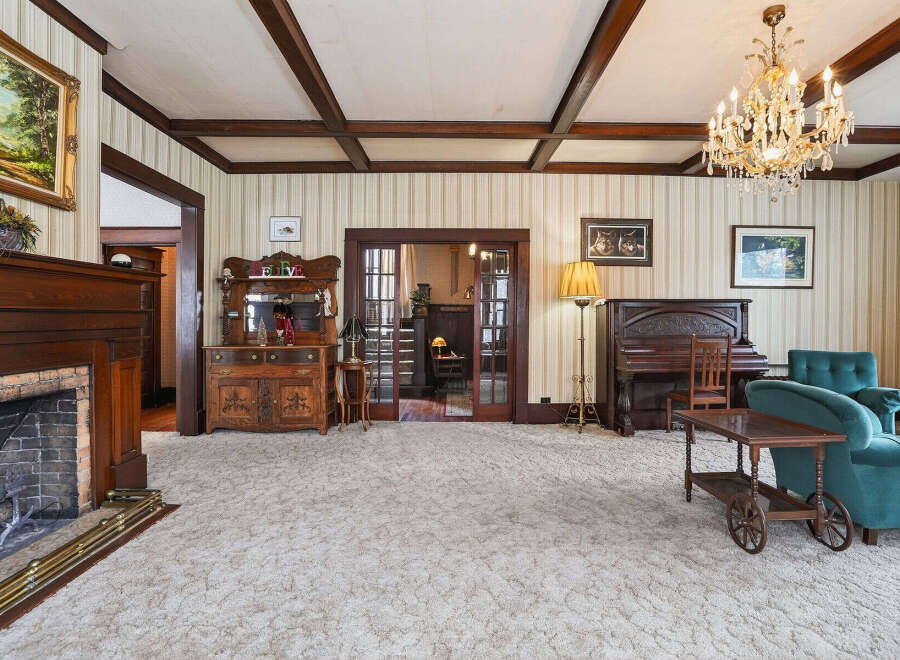 Step into this charming home and be captivated by its timeless elegance.