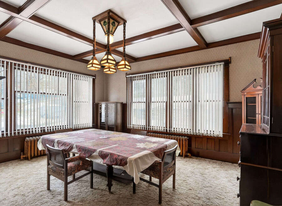 Step into a beautifully preserved dining room, showcasing timeless elegance.