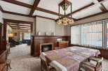 Step back in time with this stunning dining room, showcasing exquisite craftsmanship and timeless elegance.