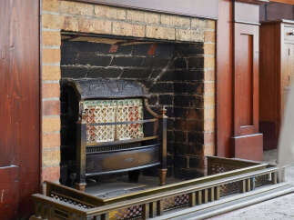 This stunning property boasts a beautiful fireplace, perfect for cozy evenings.