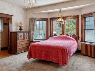 Step into a charming bedroom with timeless elegance.