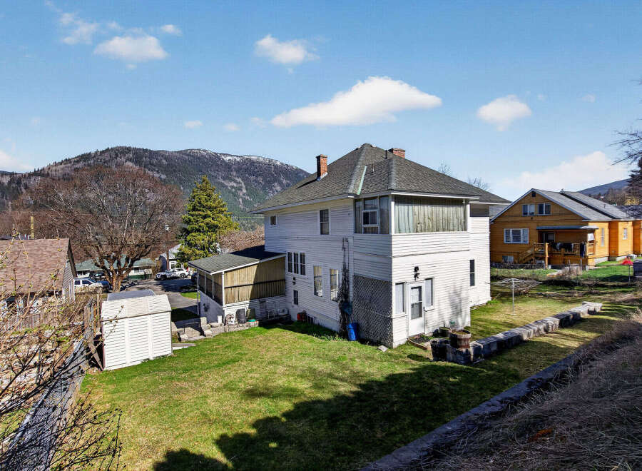 This charming two-story home offers a blend of classic design and modern comfort.