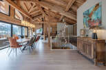 This stunning property boasts a rustic yet modern design, perfect for those seeking a luxurious mountain retreat.