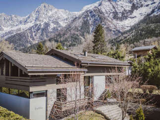 Discover the epitome of alpine luxury in this stunning property, perfectly nestled against a backdrop of majestic, snow-capped mountains.