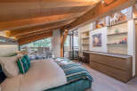 Experience luxury living in this stunning bedroom with a unique architectural design.