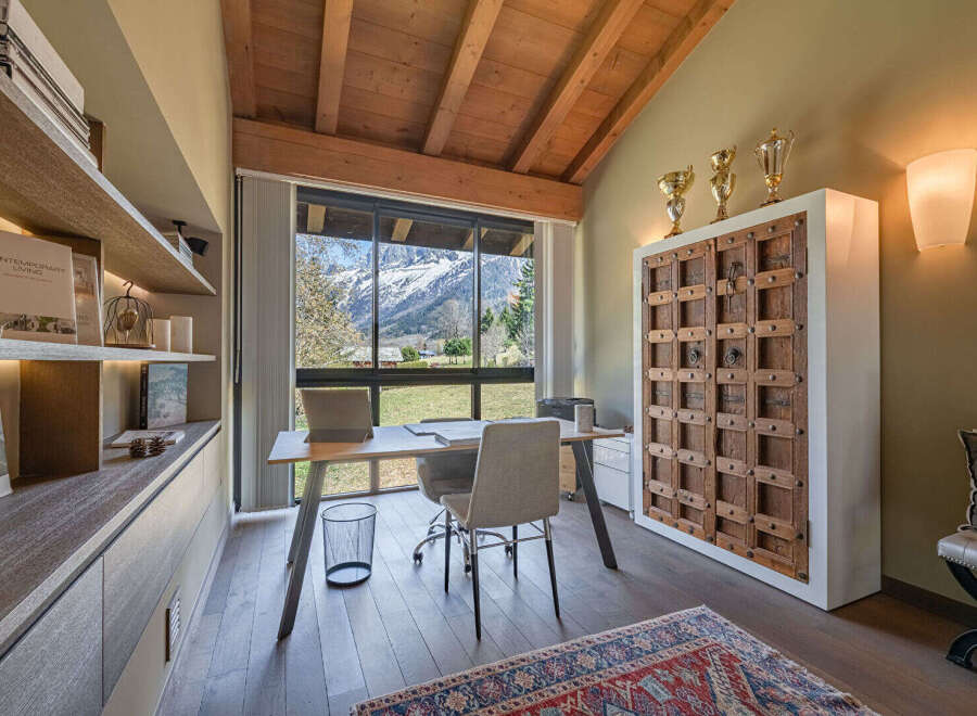 This stunning home office offers breathtaking mountain views, creating an inspiring workspace.