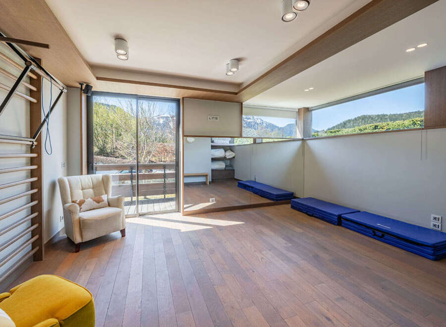 This stunning property boasts a spacious interior with a modern design, perfect for relaxation and wellness.