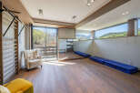 This stunning property boasts a spacious interior with a modern design, perfect for relaxation and wellness.