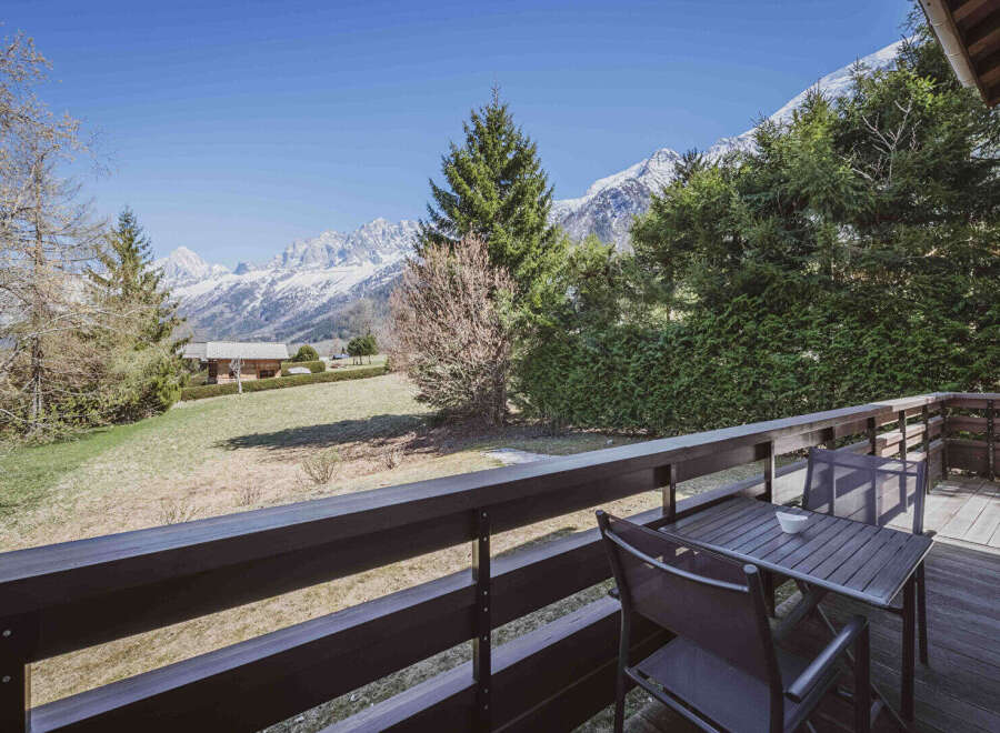 Enjoy breathtaking mountain views from this charming property.
