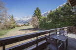 Enjoy breathtaking mountain views from this charming property.