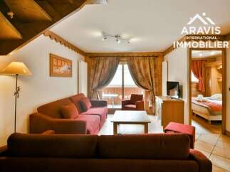 Discover the charm of this cozy property, featuring a warm and inviting living area with comfortable seating and a stylish design.