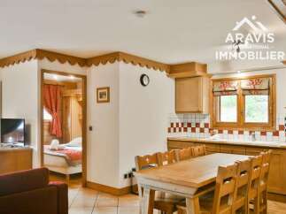 Discover the charm of this inviting property, featuring a cozy dining area perfect for gatherings.