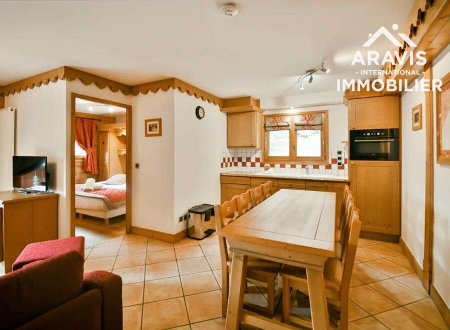 Discover the charm of this inviting property, featuring a cozy kitchen and dining area perfect for gatherings.