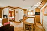Discover the charm of this inviting property, featuring a cozy kitchen and dining area perfect for gatherings.