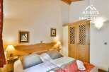Discover the charm of this cozy bedroom, perfect for a relaxing getaway.