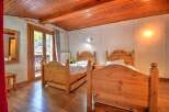 Discover a cozy bedroom retreat with rustic charm.