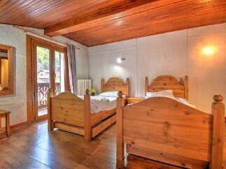 Discover a cozy bedroom retreat with rustic charm.