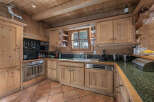 Step into the heart of this charming kitchen, where rustic elegance meets modern convenience.