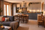 Discover this charming open-plan living and kitchen area, perfect for modern living.