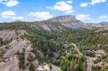 Discover a stunning property nestled in a picturesque mountain landscape.