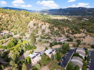 Discover a stunning property nestled in a picturesque mountain setting.