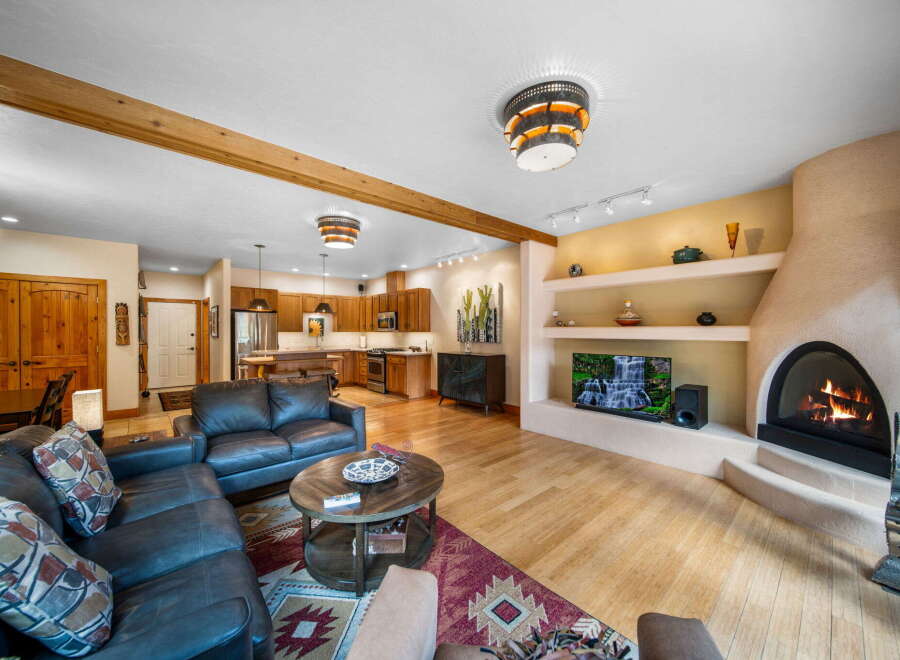 Step into luxury with this stunning property featuring a cozy fireplace, perfect for those chilly evenings.