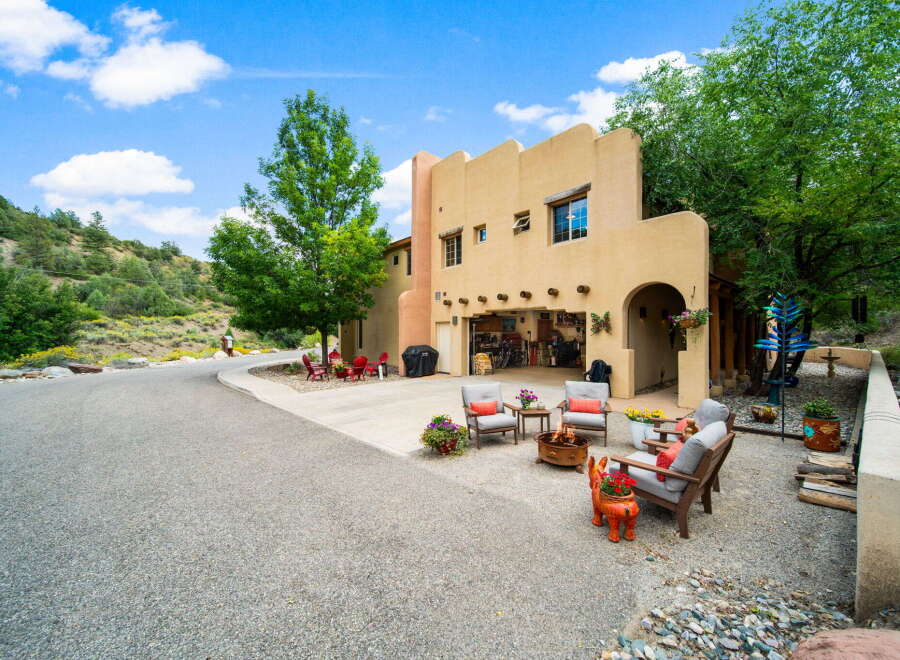 Discover the charm of this stunning property, featuring a beautifully designed exterior and inviting outdoor spaces.