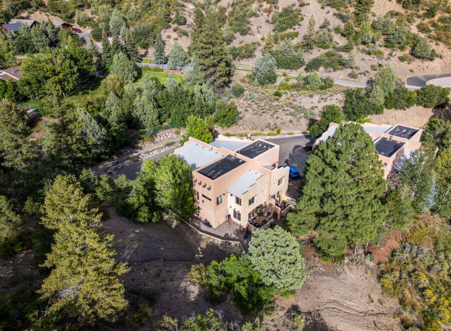 Nestled amidst lush greenery and rolling hills, this stunning property offers a serene escape.