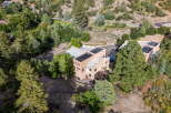 Nestled amidst lush greenery and rolling hills, this stunning property offers a serene escape.