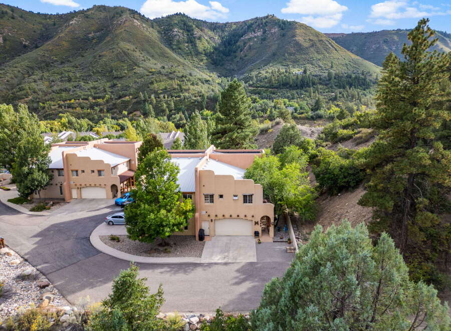 Nestled amidst the stunning backdrop of lush mountains, this property offers a serene and picturesque living experience.