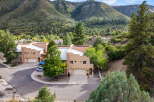 Nestled amidst the stunning backdrop of lush mountains, this property offers a serene and picturesque living experience.